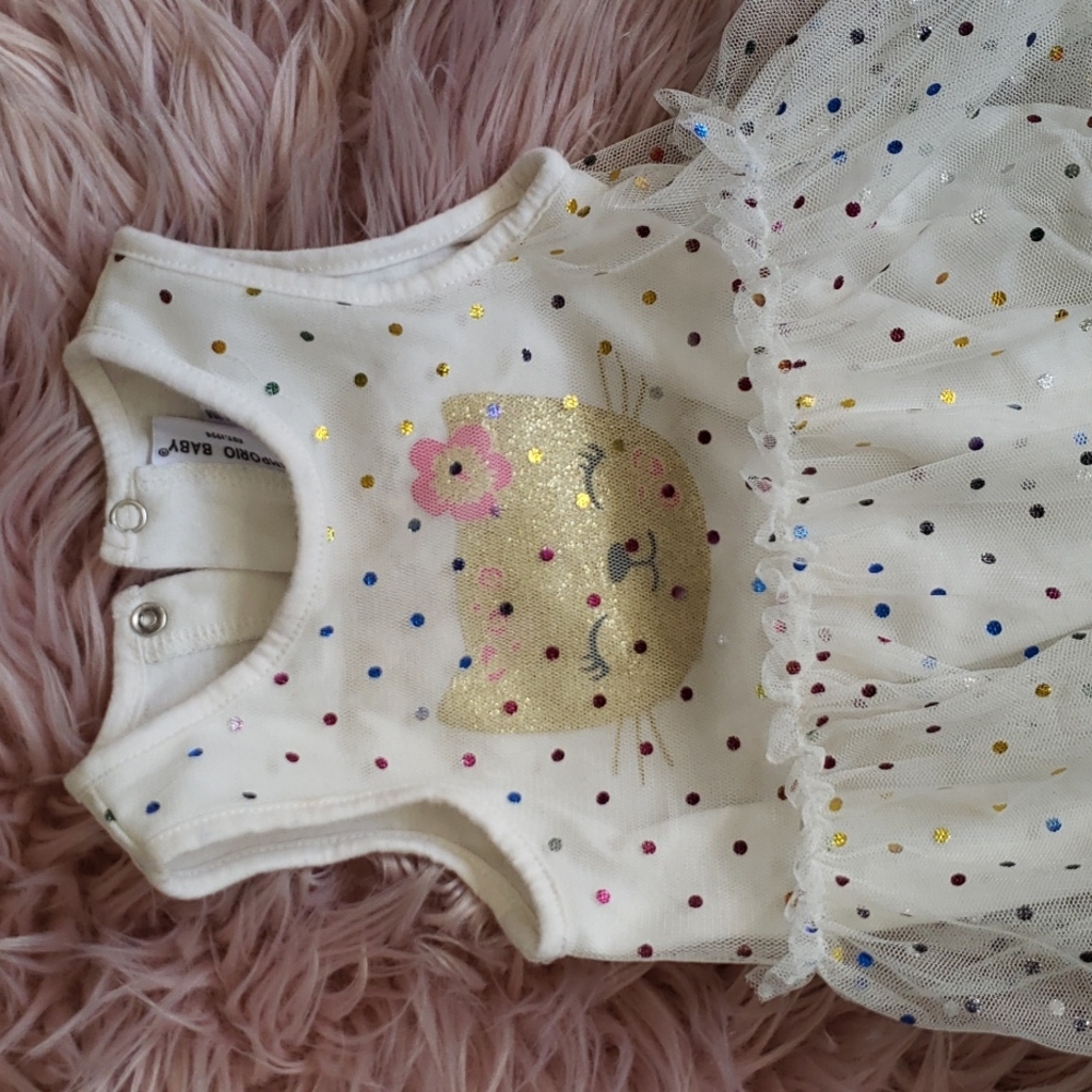 Colorful polka-dot kitty onsie. Never used.